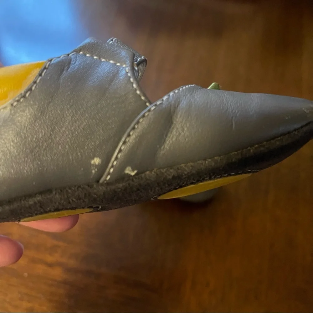 Gray Baby Shoes with Yellow Flower Accent